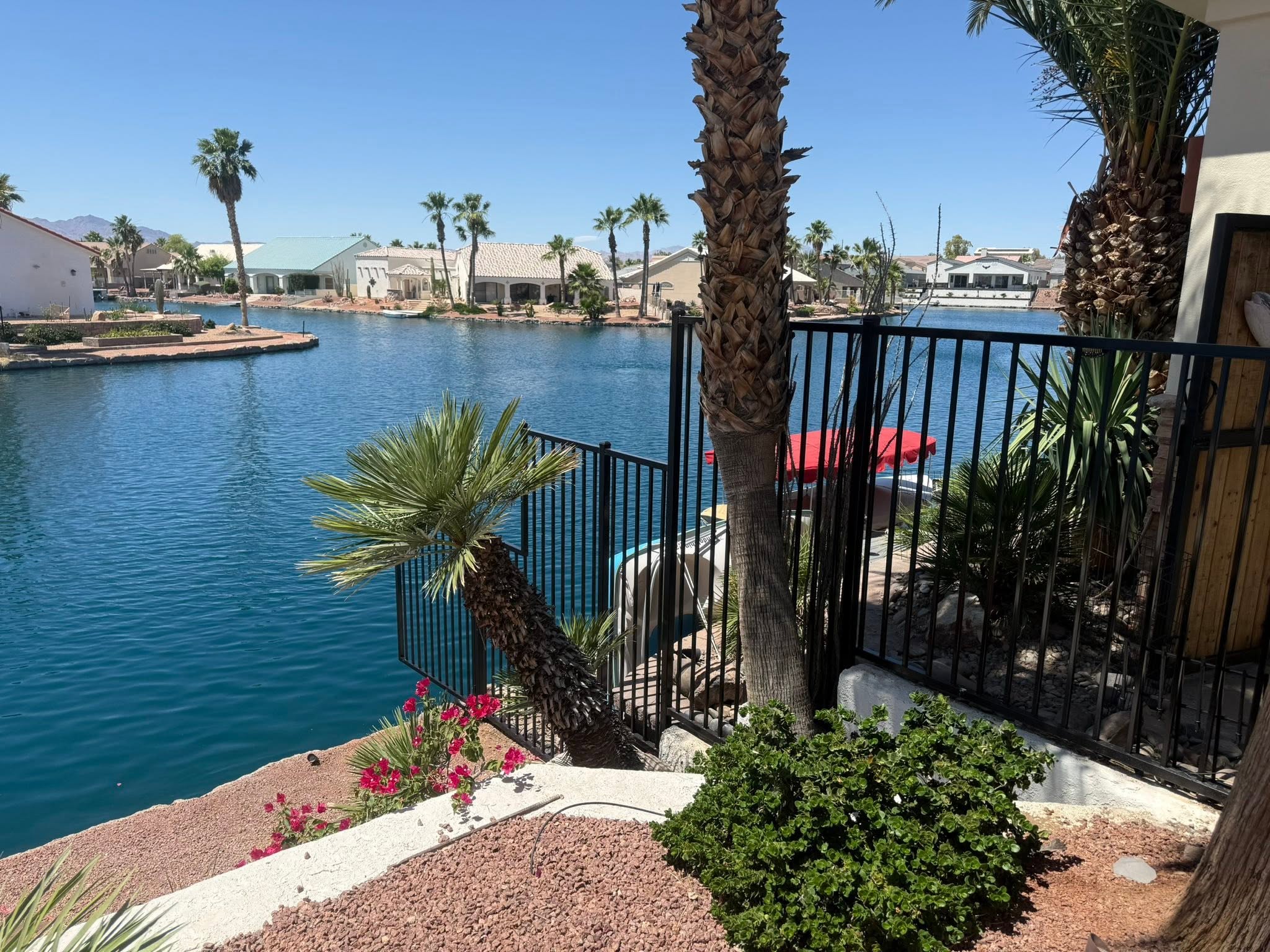 Custom iron railing and fence overlooking the water